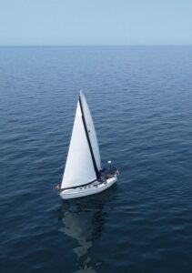 Sailboat on blue ocean